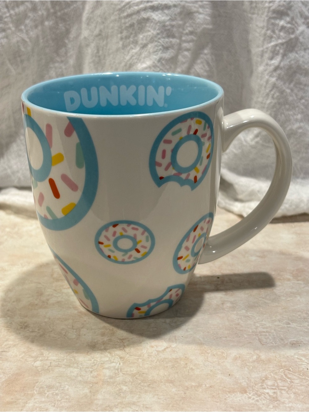Dunkin' Donut 2020 Mug 17oz white with sprinkled donuts.